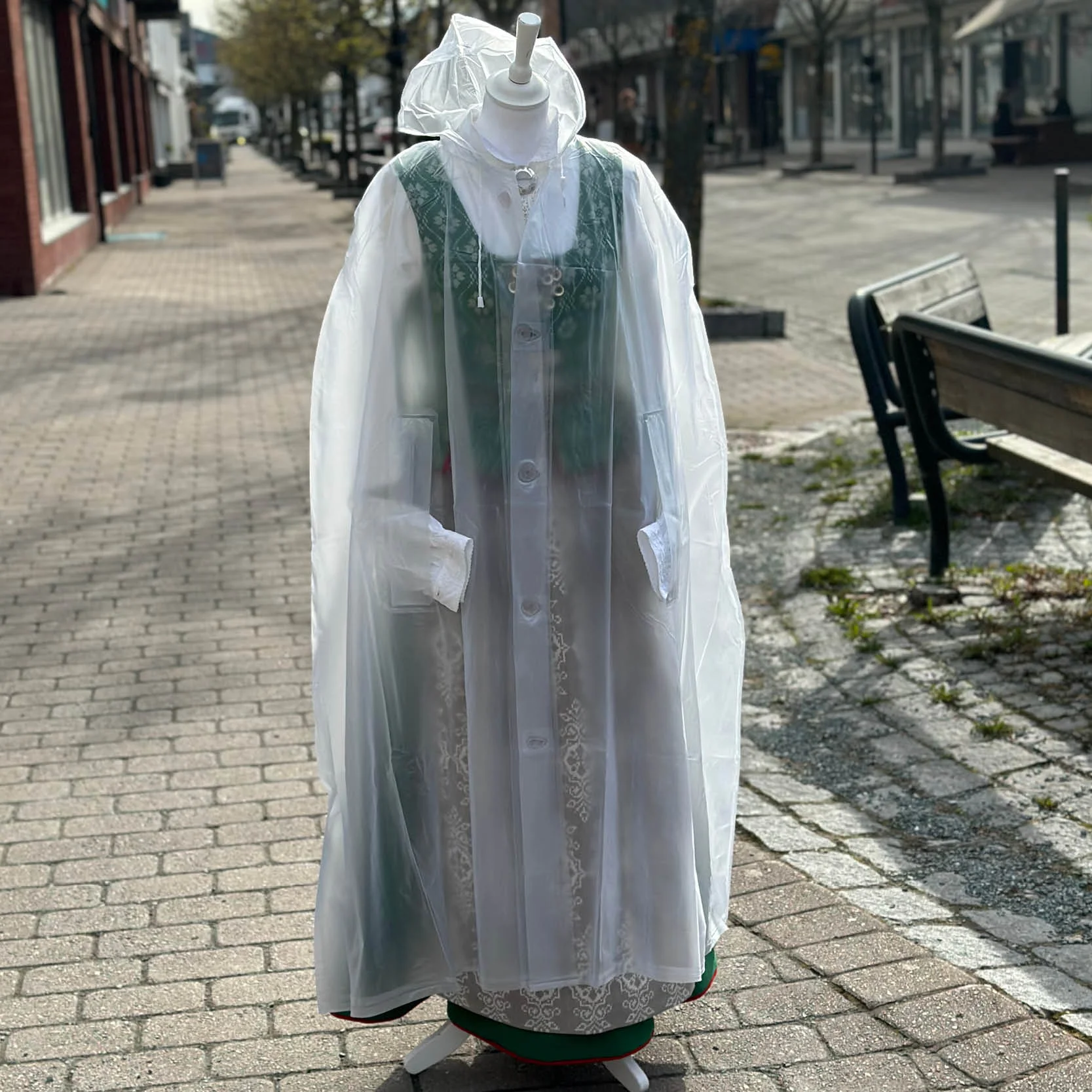 Regncape til bunaden
