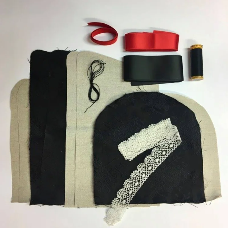 Materialpakke lue Vestfold Husflidslags 56 mod sort
